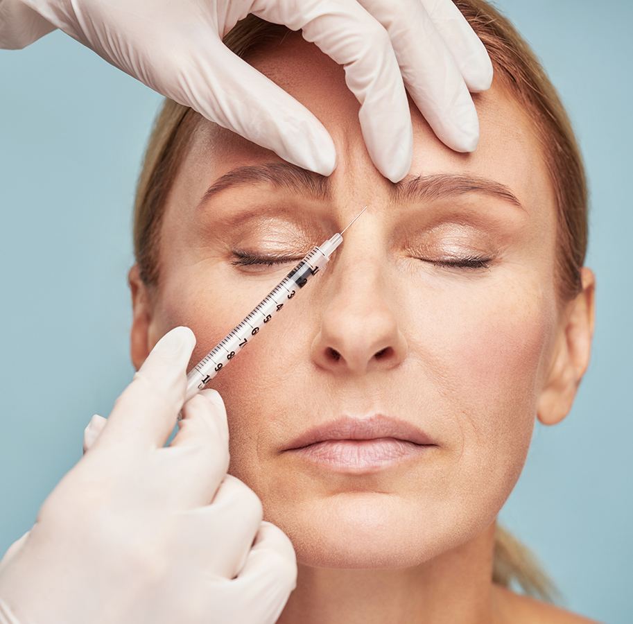 adult woman receiving injection treatment
